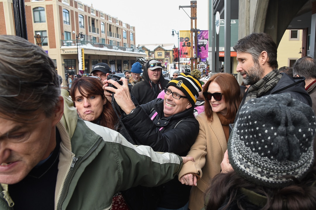 (Francisco Kjolseth  |  The Salt Lake Tribune)  Local fan Stuart Graves tries to get a selfie with Julianne Moore as the Sundance Film Festival kicks into high gear along Main street in Park City on Friday, Jan. 25, 2019.