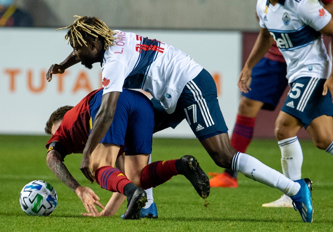 (Rick Egan  |  The Salt Lake Tribune)   Vancouver Whitecaps midfielder Leonard Owusu (17) keeps  Real Salt Lake midfielder Albert Rusnak (11) from getting the ball, in MLS soccer action between Real Salt Lake and the Vancouver Whitecaps at Rio Tinto Stadium on Saturday, Sept. 19, 2020. 
