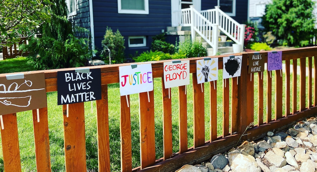 (Marina Gomberg | The Salt Lake Tribune)   Marina Gomberg wants to do what she can to raise a son who isn't racist. With that in mind, she made these signs with him.