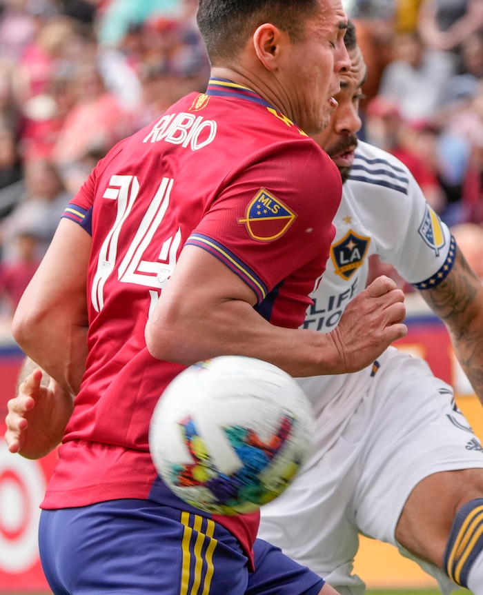 (Leah Hogsten | The Salt Lake Tribune) Real Salt Lake forward Rubio Rubin (14) battles Los Angeles Galaxy defender Derrick Williams (3) for possession as Real Salt Lake hosts LA Galaxy at Rio Tinto Stadium, Saturday, April 30, 2022. Real Salt Lake defender Marcelo Silva (30) scored the one goal to win the match 1-0.
