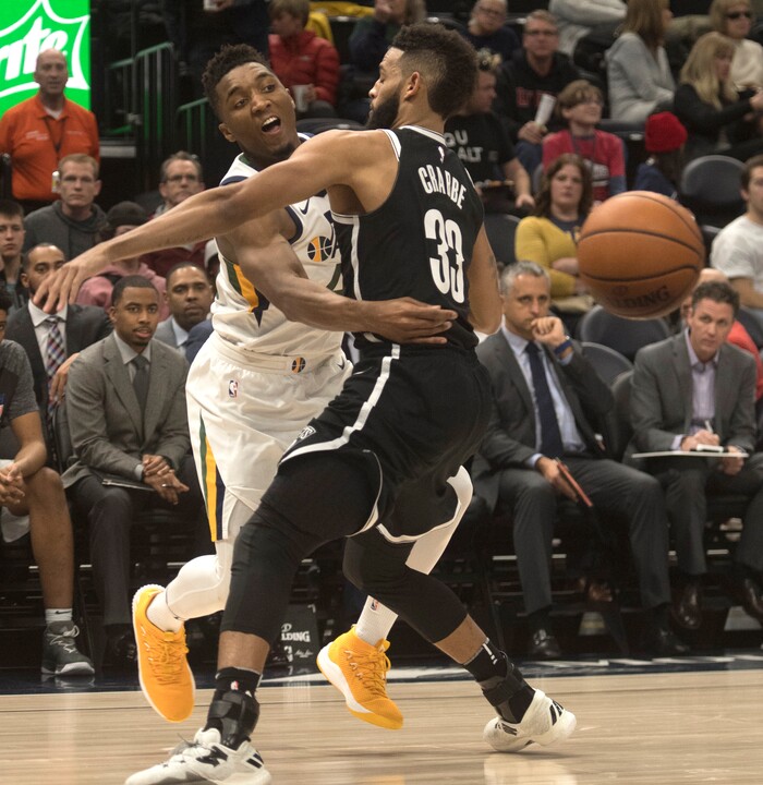 (Rick Egan  |  The Salt Lake Tribune)  Utah Jazz guard Donovan Mitchell (45) fires the ball past Brooklyn Nets guard Allen Crabbe (33), in NBA action, Utah Jazz vs. Brooklyn Nets, in Salt Lake City, Saturday, November 11, 2017.