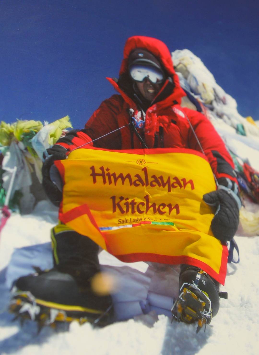 (Leah Hogsten  |  Tribune file photo)  In 2014, a wall of the Himalayan Kitchen restaurant is dedicated to Surya Bastakoti's great friend and fellow Tibetan, Apa Sherpa, (pictured) the only person in the world to summit Mt. Everest 21 times.  Surya Bastakoti is the owner of Himalayan Kitchen in downtown Salt Lake City.