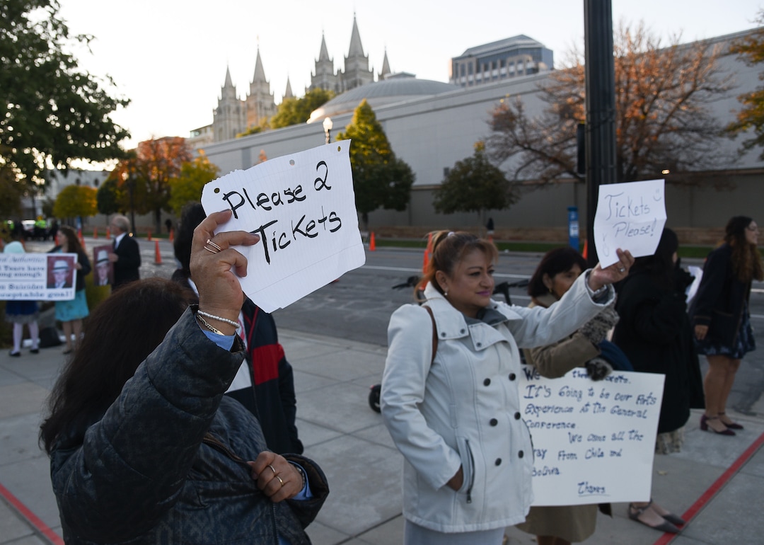 (Francisco Kjolseth  |  The Salt Lake Tribune)  People hope for tickets as they arrive for the Sunday session of the 189th twice-annual General Conference of The Church of Jesus Christ of Latter-day Saints at the Conference Center in Salt Lake City on Sunday, Oct. 6, 2019.
