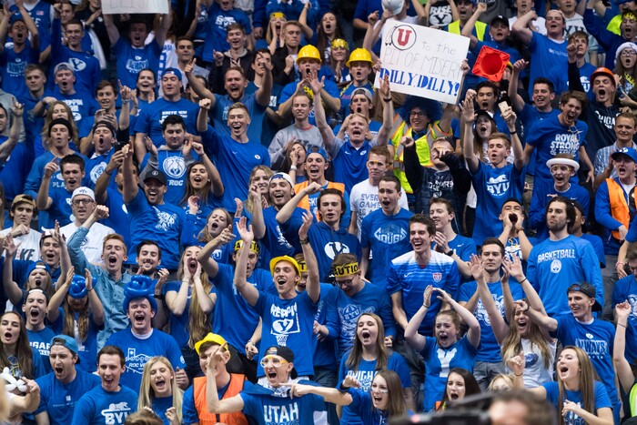 (Rick Egan  |  The Salt Lake Tribune)   Brigham Young fans celebrate the Cougars  77-65 win over Utah Utes, in basketball action Utah Utes vs. Brigham Young Cougars at the Marriott Center in Provo, Saturday, December 15, 2017.


