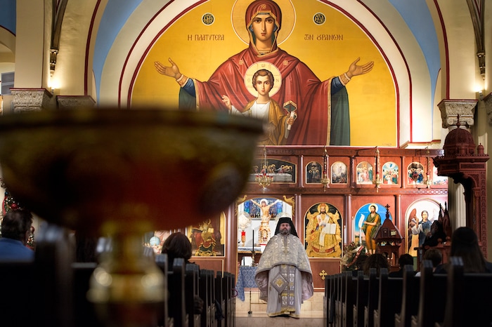(Scott Sommerdorf | The Salt Lake Tribune)
The Very Rev. Archimandrite George Nikas leads the Epiphany service (also called Theophany in Orthodox), at Holy Trinity Cathedral, Saturday, January 6, 2018.