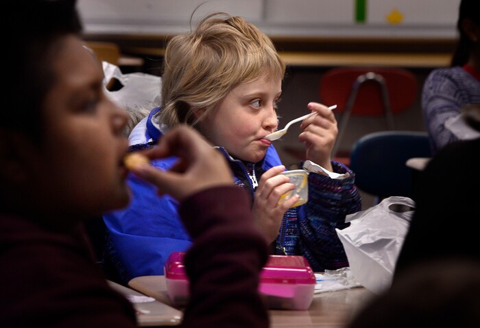 Scott Sommerdorf | The Salt Lake TribunePatience Campbell, 10, eats her applesauce in Mr. Mills' 4th grade class at Backman Elementary SchoolÕs Breakfast in the Classroom program, Wednesday, March 21, 2018.