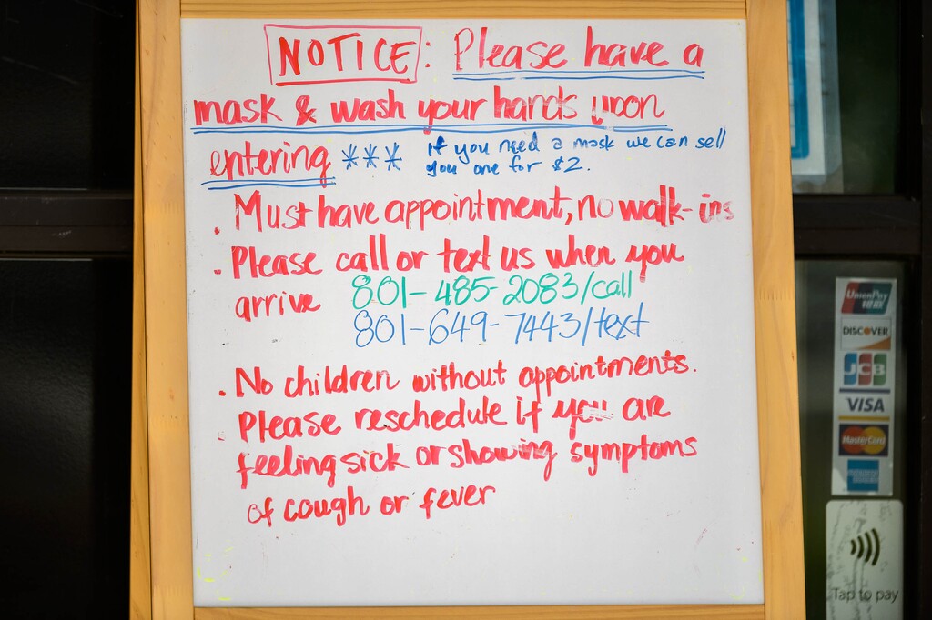 (Trent Nelson  |  The Salt Lake Tribune) A sign detailing COVID-19 procedures and precautions at Sugarhouse Nail Co in Salt Lake City on Monday, June 22, 2020.