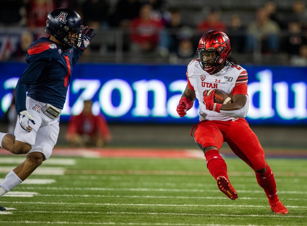 (Rick Egan  |  The Salt Lake Tribune)     Utah running back Zack Moss (2) runs the ball for the Utes, in PAC-12 action between the Utah Utes and the Arizona Wildcats in Tucson, Saturday, Nov. 23, 2019.