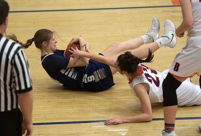 (Scott Sommerdorf   |  The Salt Lake Tribune)   Skyline's Kate Vorwaller and Brighton's Sidney Kaufman compete for a loose ball during first half play. Skyline defeated Brighton 66-33, Friday, January 5, 2018.