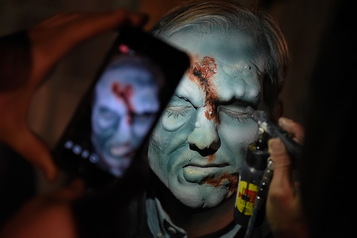 (Francisco Kjolseth  |  The Salt Lake Tribune)  Salt Lake County Mayor Ben McAdams is transformed by makeup artist Stephanie Withers as local politicians fall prey to the zombie apocalypse at the Fear Factory on Thursday, Oct. 12, 2017, for a special event to raise awareness of the Utah Food Bank and kick start donations.