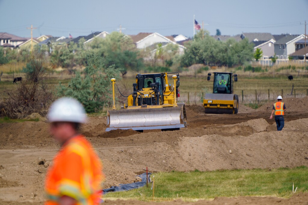 (Trent Nelson  |  The Salt Lake Tribune) Crews with heavy equipment work on the West Davis Highway project in Layton on Tuesday, May 25, 2021.