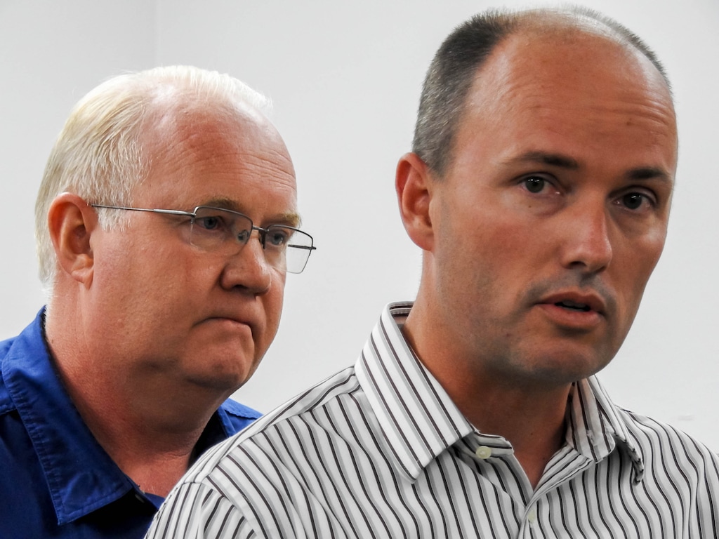 Trent Nelson | The Salt Lake Tribune
Utah Lt. Governor Spencer Cox, right, speaks with Hildale Mayor Phillip Barlow at left, after nine people were killed and five remained missing Tuesday morning, the day after an SUV and a van were washed off a road during a flash flood in this polygamous Utah-Arizona border community.