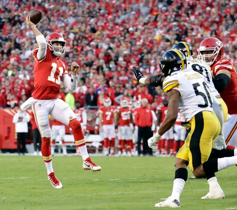 Kansas City Chiefs quarterback Alex Smith (11) throws the ball away during the second half of an NFL football game against the Pittsburgh Steelers in Kansas City, Mo., Sunday, Oct. 15, 2017. (AP Photo/Charlie Riedel)