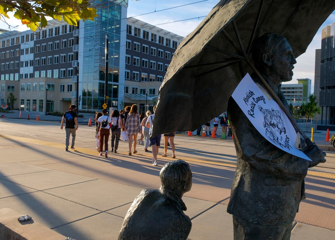 (Leah Hogsten  |  The Salt Lake Tribune) Protesters walk to the West Valley Police Department during the People's Council rally to defund the police force, Aug.8, 2020.  Saturday's rally was hosted by the Salt Lake chapter of the Party for Socialism and Liberation.