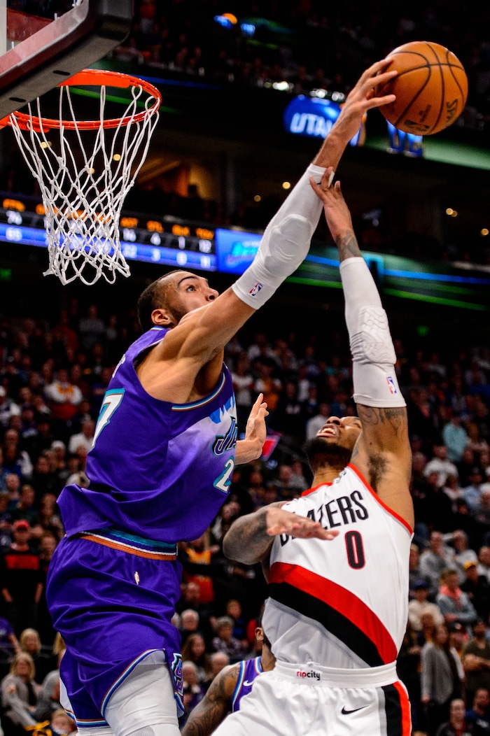 (Trent Nelson  |  The Salt Lake Tribune) Utah Jazz center Rudy Gobert (27) blocks a shot by Portland Trail Blazers guard Damian Lillard (0) with three seconds remaining, as the Utah Jazz host the Portland Trail Blazers, NBA basketball in Salt Lake City on Thursday, Dec. 26, 2019.
