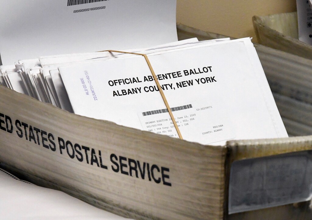 (Hans Pennink | AP file photo) A box of absentee ballots wait to be counted at the Albany County Board of Elections in Albany, N.Y., on June 30, 2020.