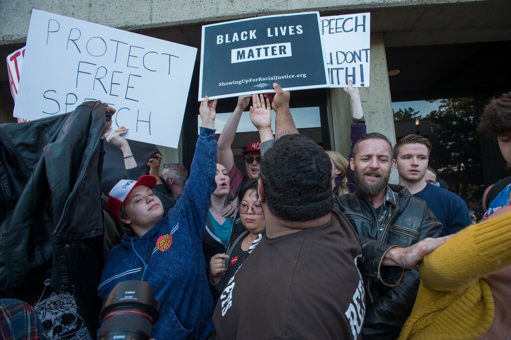 (Rick Egan  |  The Salt Lake Tribune)  Protesters jockey for position on the steps of the Fine Arts Auditorium as they shout slogans outside the building where Ben Shapiro is speaking on the campus of University of Utah, Wednesday, September 27, 2017.
