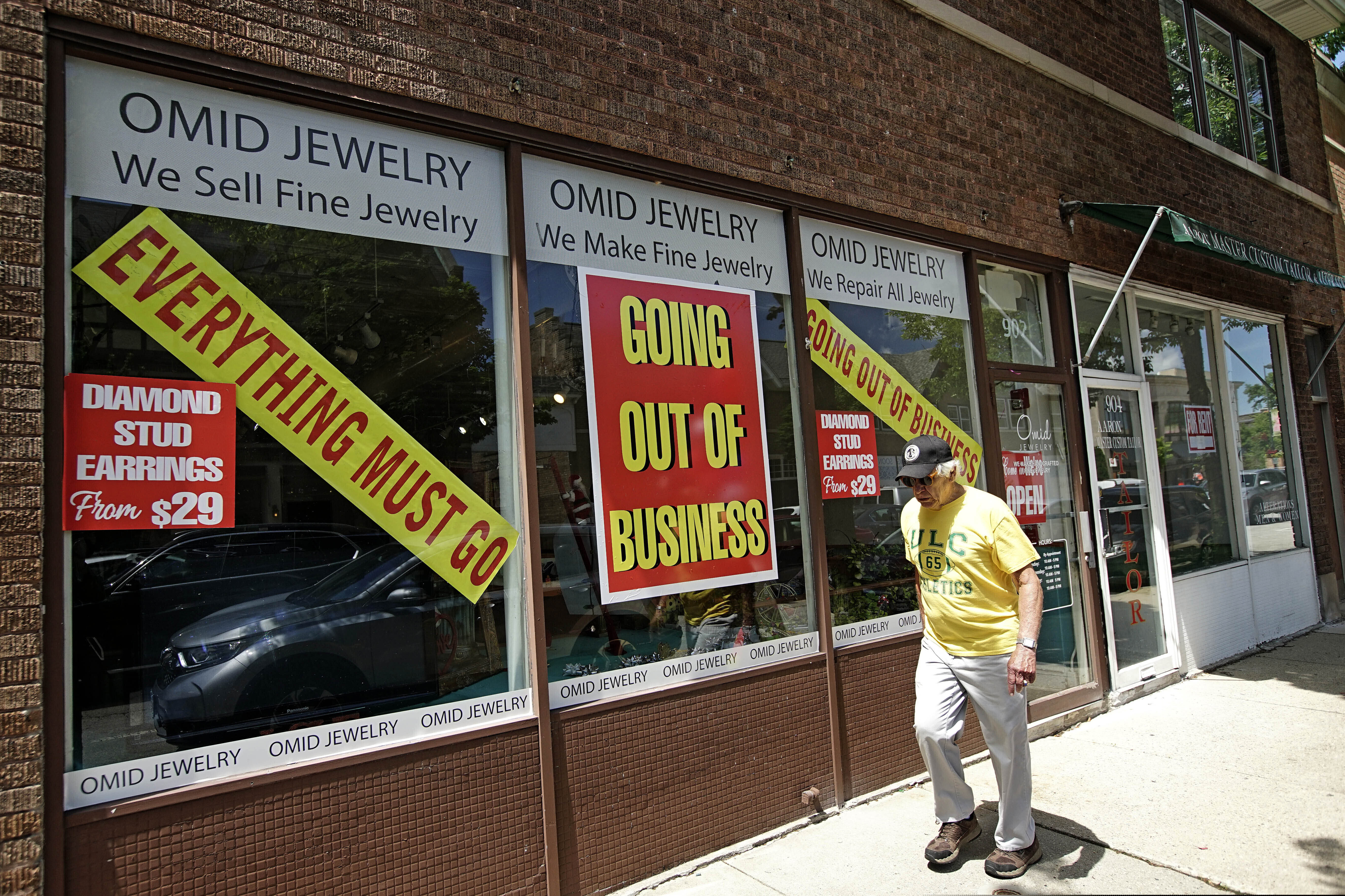(Nam Y. Huh | AP Photo)

A man walks past a retail store that is going out of business due to the coronavirus pandemic in Winnetka, Ill., Tuesday, June 23, 2020.  More than 1.4 million laid-off Americans applied for unemployment benefits last week, reported Thursday, July 30, further evidence of the devastation the coronavirus outbreak has unleashed on the U.S. economy.