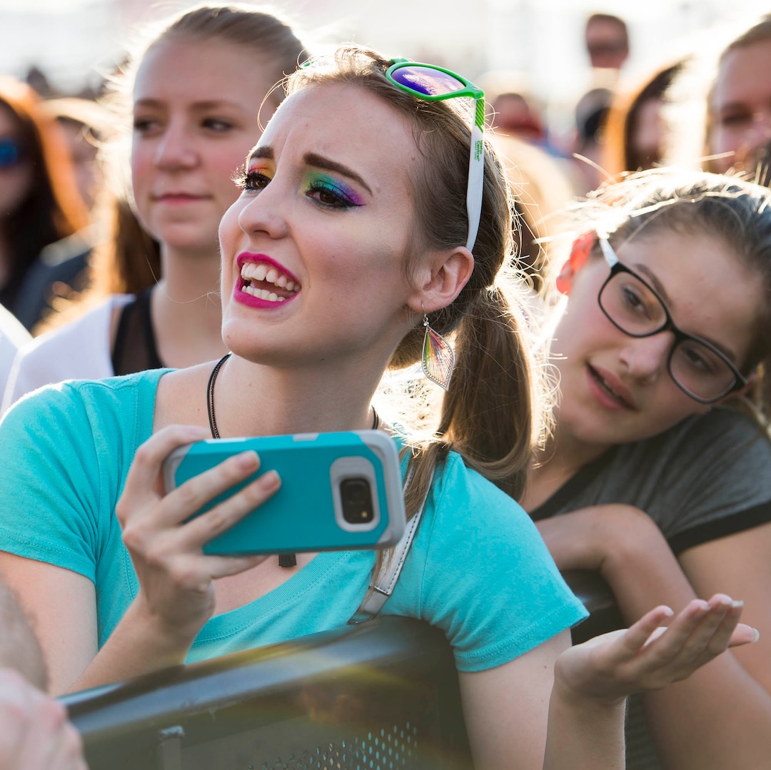 (Rick Egan  |  The Salt Lake Tribune)Alea Nolaz sings along with Nicholas Perticca from Walk The Moon, at the LoveLoud Festival at Brent Brown Ballpark at UVU campus, Saturday, August 26, 2017.