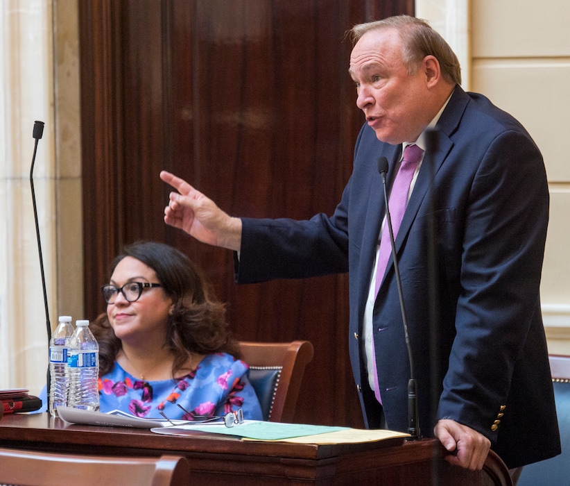 (Rick Egan  |  Tribune file photo)  Sen. Jim Dabakis talks about the inland port, in the senate, during a special session at the Utah State Capitol, Wednesday, July 18, 2018. Dabakis is currently running to be Salt Lake City mayor, as is Sen. Luz Escamilla, D-Salt lake City, pictured here seated next to Dabakis.