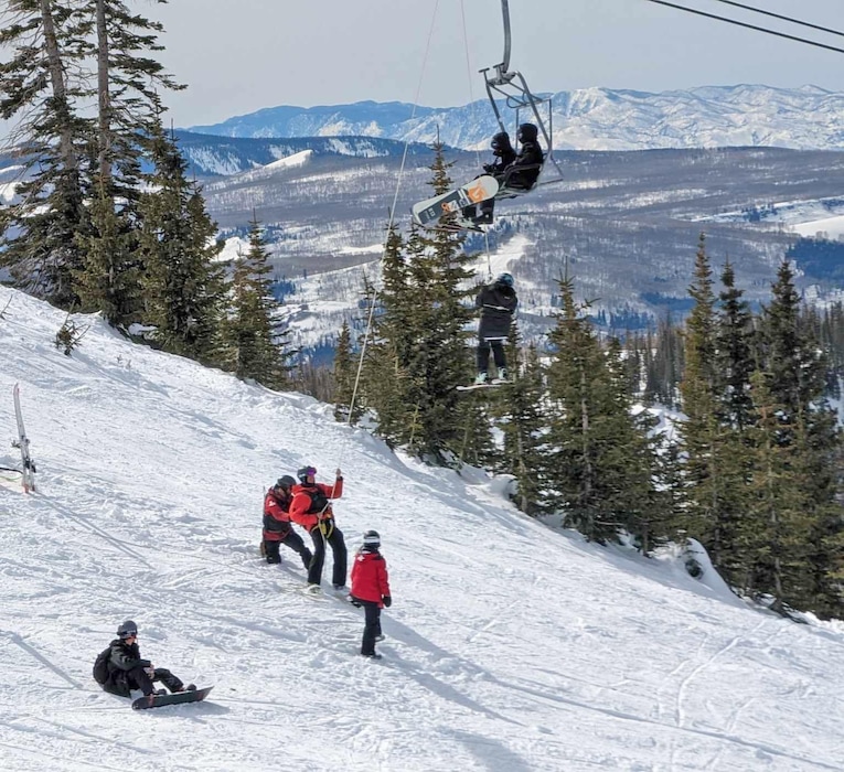 (Zack Selznick | contributed) Brian Head Resort ski patrollers perform a rope evacuation of snowboarders who were trapped on the Giant Steps Express lift Sunday, Feb. 25, 2024, when a cable released.