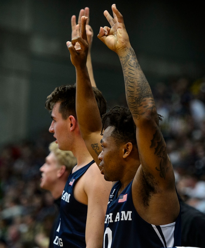 (Steve Griffin  |  The Salt Lake Tribune) Brigham Young Cougars guard Jahshire Hardnett (0) celebrates a three-pointer during the BYU versus UVU basketball game at UCCU Center on the UVU campus in Orem Wednesday November 29, 2017.