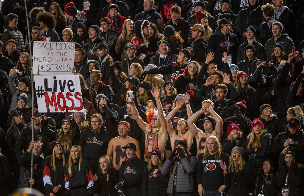 (Rick Egan  |  The Salt Lake Tribune)  Utah fans celebrate running back Zack Moss' 115-yard, two-touchdown night in a 35-0 win over California on Saturday at Rice-Eccles Stadium.