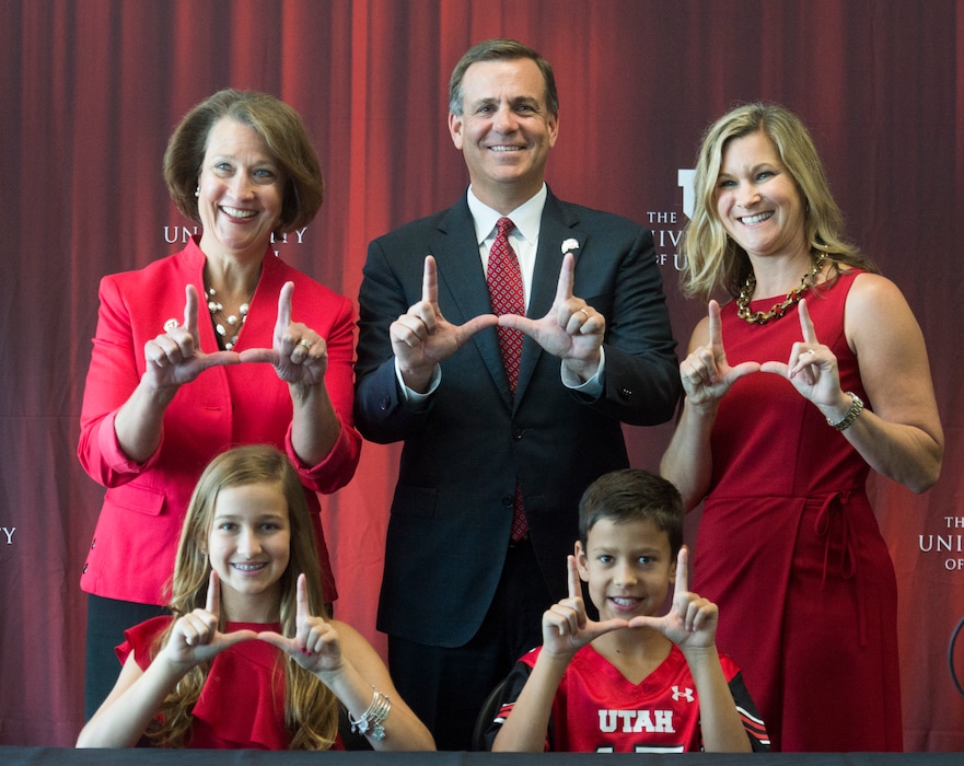 (Rick Egan  |  The Salt Lake Tribune)   University of Utah President Ruth V. Watkins poses with Mark Harlan, his wife Carolyn, and their children, Savanah 13, and Austin, 10, during a news conference at the Rice-Eccles Stadium,  Monday, June 4, 2018.