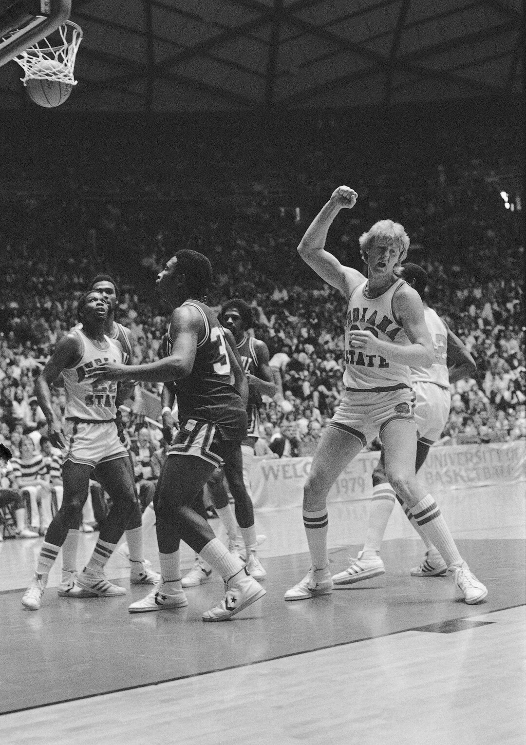 (AP Photo) Indiana State player Larry Bird reacts as his shot zips through the basket to score against DePaul in their semi-final game of the NCAA Championships in Salt Lake City Saturday March 24, 1979.
