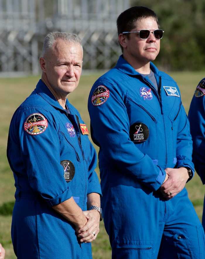 NASA astronauts Doug Hurley, left, and Bob Behnken attend a news conference before the Falcon 9 SpaceX Crew Demo-1 rocket launch at the Kennedy Space Center in Cape Canaveral, Fla., Friday, March 1, 2019. The astronauts are assigned to fly in the SpaceX Demo-2 flight test later this year. (AP Photo/John Raoux)