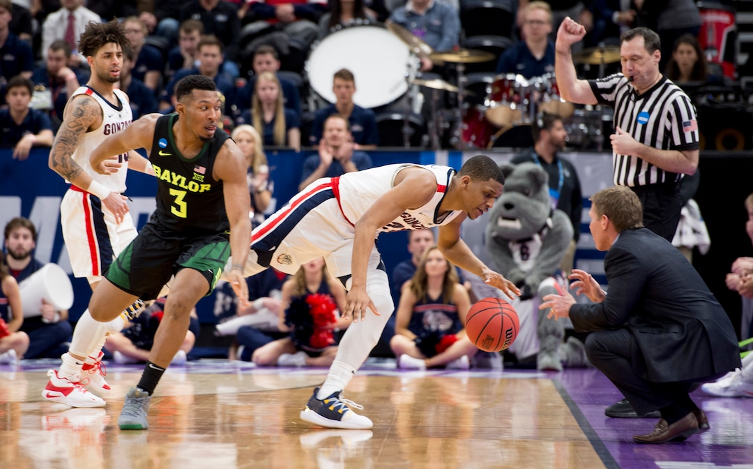 (Leah Hogsten  | The Salt Lake Tribune)  Baylor Bears guard King McClure (3) fouls Gonzaga Bulldogs guard Zach Norvell Jr. (23) as Baylor faces Gonzaga in the second round of the NCAA tournament in Salt Lake City on Saturday, March 23, 2019.