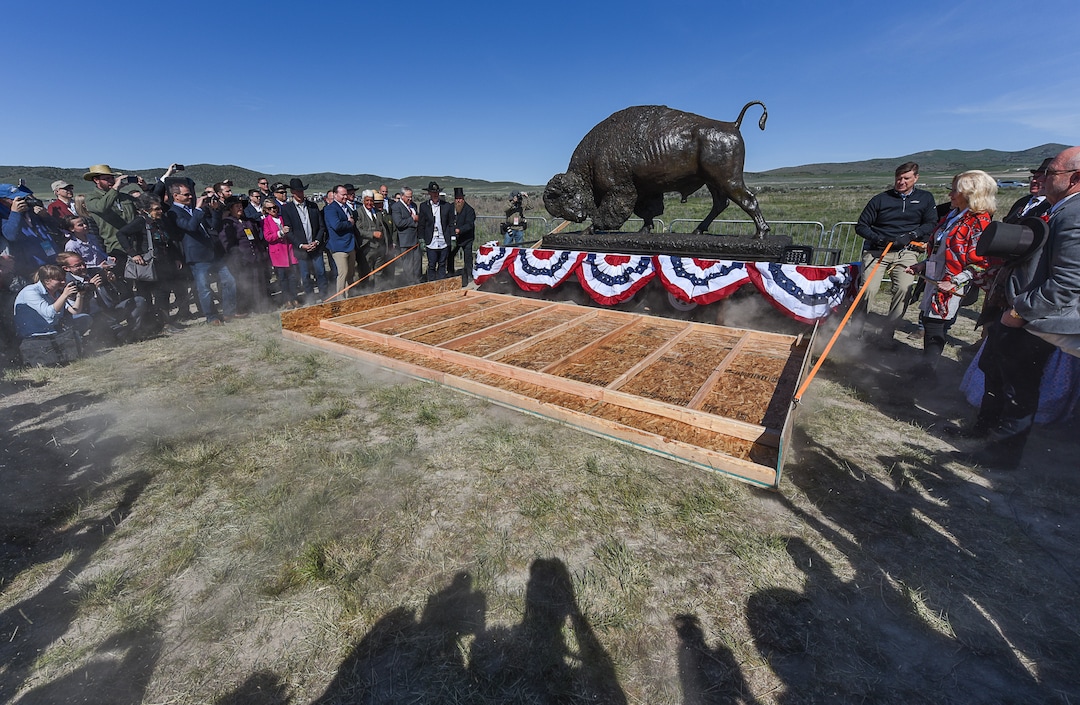 (Francisco Kjolseth  |  The Salt Lake Tribune)  Dust flies as the wall covering the Distant Thunder sculpture is unveiled on Friday May 10, 2019, in celebration of the 150th anniversary of the completion of the transcontinental railroad at Promontory Summit where the two rails met back on May 10, 1869.