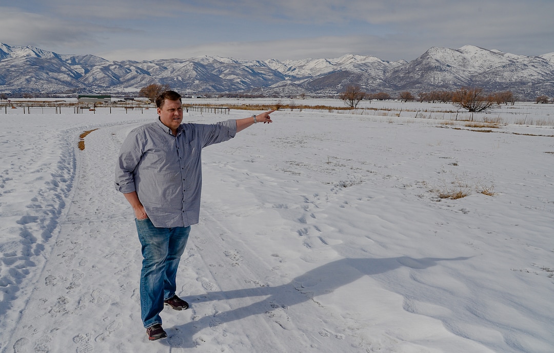 (Francisco Kjolseth  |  The Salt Lake Tribune)  Midway resident Bengt Jonsson, points out the route a new transmission line will follow through the north fields of the Heber Valley. Jonsson and others are trying to convince Rocky Mountain Power to bury a one-mile stretch of the  transmission line through the town of Midway. They are even willing to cover the cost, but the utility is challenging the town's requirement that the new line go underground.