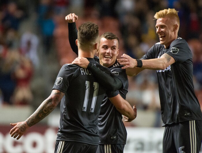 (Rick Egan  |  The Salt Lake Tribune)     Real Salt Lake forward Brooks Lennon (12) and Real Salt Lake defender Justen Glad (15) celebrate the goal by Real Salt Lake midfielder Albert Rusnak (11) late in the game, in MLS soccer action, between Real Salt Lake and Colorado Rapids,  at Rio Tinto Stadium, Saturday, April 21, 2018.



