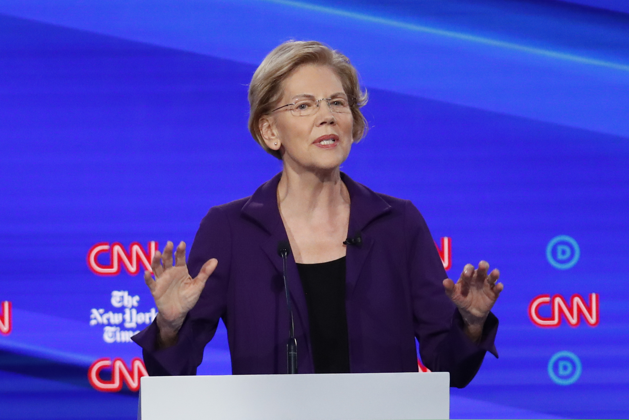 (John Minchillo | AP) Democratic presidential candidate Sen. Elizabeth Warren, D-Mass., speaks during a Democratic presidential primary debate hosted by CNN and The New York Times at Otterbein University, Tuesday, Oct. 15, 2019, in Westerville, Ohio.