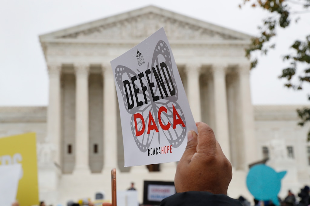 (Jacquelyn Martin | The Associated Press) In this Nov. 12, 2019, file photo people rally outside the Supreme Court.
