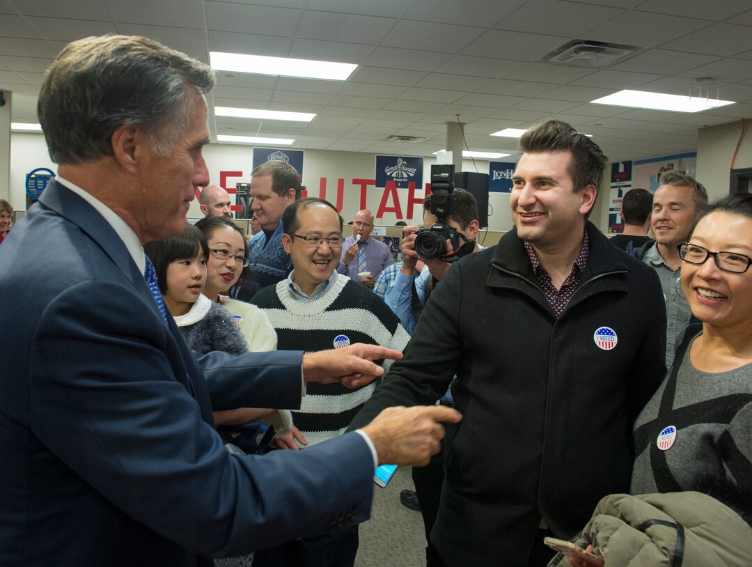 (Rick Egan  |  The Salt Lake Tribune)   Mitt Romney shakes hands with Greg Klekes and Jessie Li at the Romney Headquarters, in Orem, as they wait for the polls to close, on election night, Tuesday, Nov. 6, 2018.