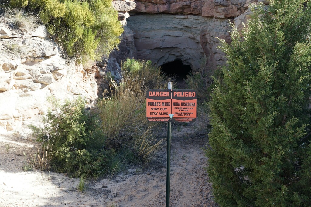 (Zak Podmore | The Salt Lake Tribune) A Bureau of Land Management sign warns public land users to stay out of the abandoned None Such Mine in 2021. The Good Samaritan Remediation of Abandoned Hardrock Mines Act could make it easier for state agencies, local governments and nonprofits to take on low-risk reclamation projects in Utah.
