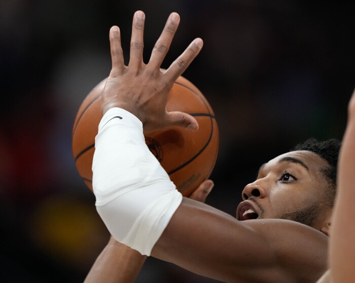 (Francisco Kjolseth | The Salt Lake Tribune) Utah Jazz guard Donovan Mitchell (45) lines up his shot in NBA action between the Utah Jazz and the Minnesota Timberwolves at Vivint Smart Home Arena in Salt Lake City, Thursday, Dec. 23, 2021.