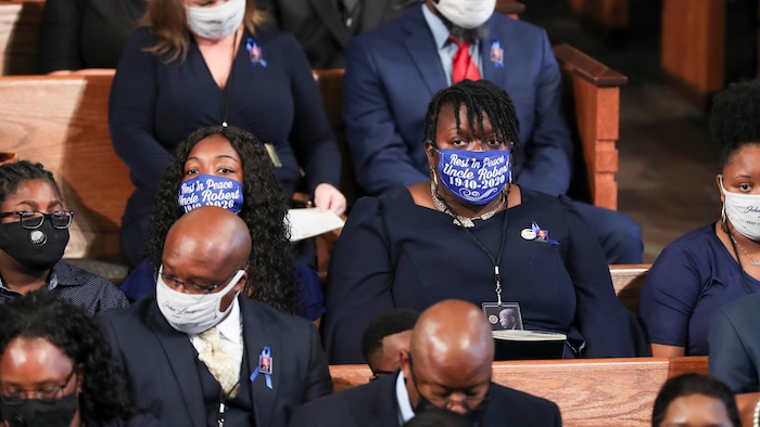Family members attend the funeral service for the late Rep. John Lewis, D-Ga., at Ebenezer Baptist Church in Atlanta, Thursday, July 30, 2020.    (Alyssa Pointer/Atlanta Journal-Constitution via AP, Pool)