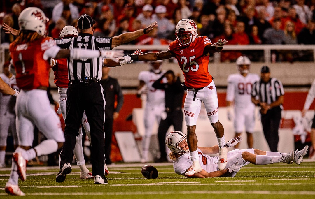 (Trent Nelson | The Salt Lake Tribune)  Utah Utes defensive back Casey Hughes (25) signals incomplete as Stanford Cardinal wide receiver Trenton Irwin (2) is on the ground, as the University of Utah hosts Stanford, NCAA football at Rice-Eccles Stadium in Salt Lake City Saturday October 7, 2017.