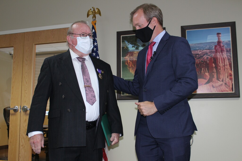 (Photo courtesy of Alyson Heyrend)
Douglas W. Evans, left, is presented a Purple Heart by Rep. Ben McAdams, D-Utah, at a ceremony July 13, 2020, at McAdams' office in West Jordan. Evans was in the U.S. Army in Vietnam on Oct. 15, 1966, when soldiers in his squad detonated mines that wounded him and killed another man.