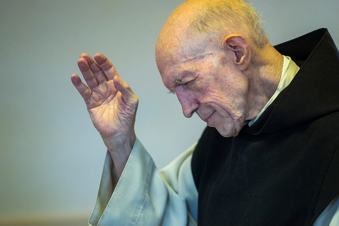 (Chris Detrick  |  The Salt Lake Tribune)  "Father Patrick" Boyle blesses the Vore family, of Farr West, in the bookstore and gift shop at the Abbey of Our Lady of the Holy Trinity in Huntsville on Wednesday, Aug. 23, 2017.