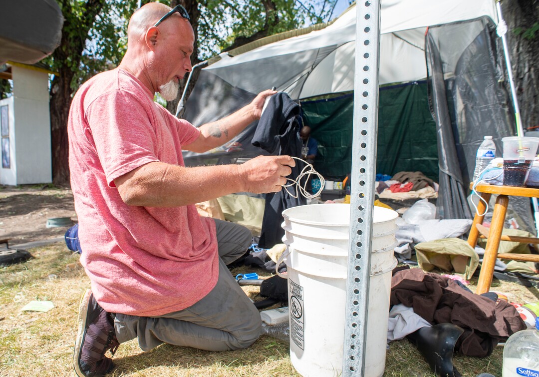 (Rick Egan  |  The Salt Lake Tribune) Richard Ryan prepares to move his camp on Wednesday, Sept. 9, 2020, after getting notified that first thing in the morning he will be forced to move from Taufer Park in Salt Lake City, fearing everything will be taken from him if he is not prepared when they arrive.