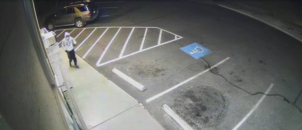 (Screengrab from surveillance video) Ogden Police shared video surveillance footage that shows a man suspected of fatally shooting a convenience store owner on Sunday. Police announced Thursday that they had arrested a boy in connection with the killing.