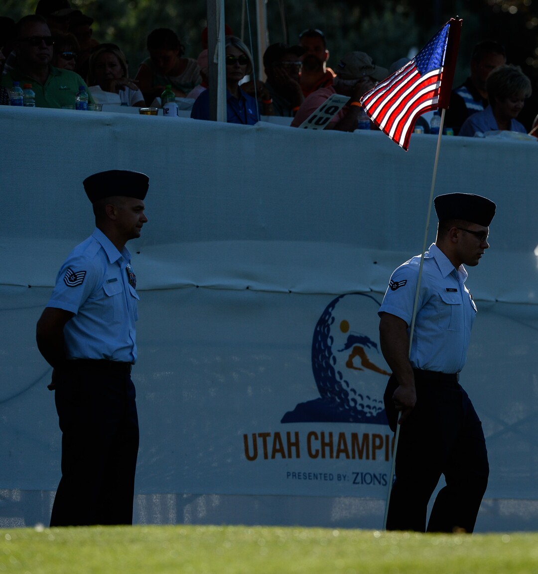(Francisco Kjolseth  |  The Salt Lake Tribune)  Joseph Hess, left, and Joseph Gourley of Hill Air Force Base pull the 18th hole flag on the final day of the Utah Championship golf event on the Web.com Tour at Oakridge Country Club in Farmington on Sunday, July 15, 2018.