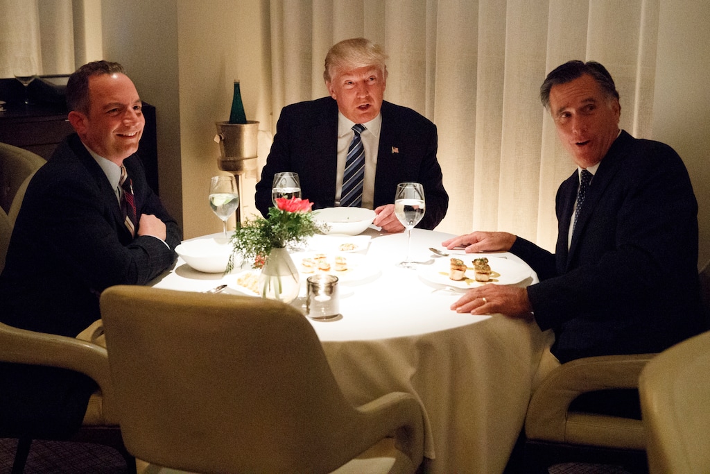 President-elect Donald Trump, center, eats dinner with Mitt Romney, right, and Trump Chief of Staff Reince Priebus at Jean-Georges restaurant Nov. 29, 2016, in New York. (AP Photo/Evan Vucci)