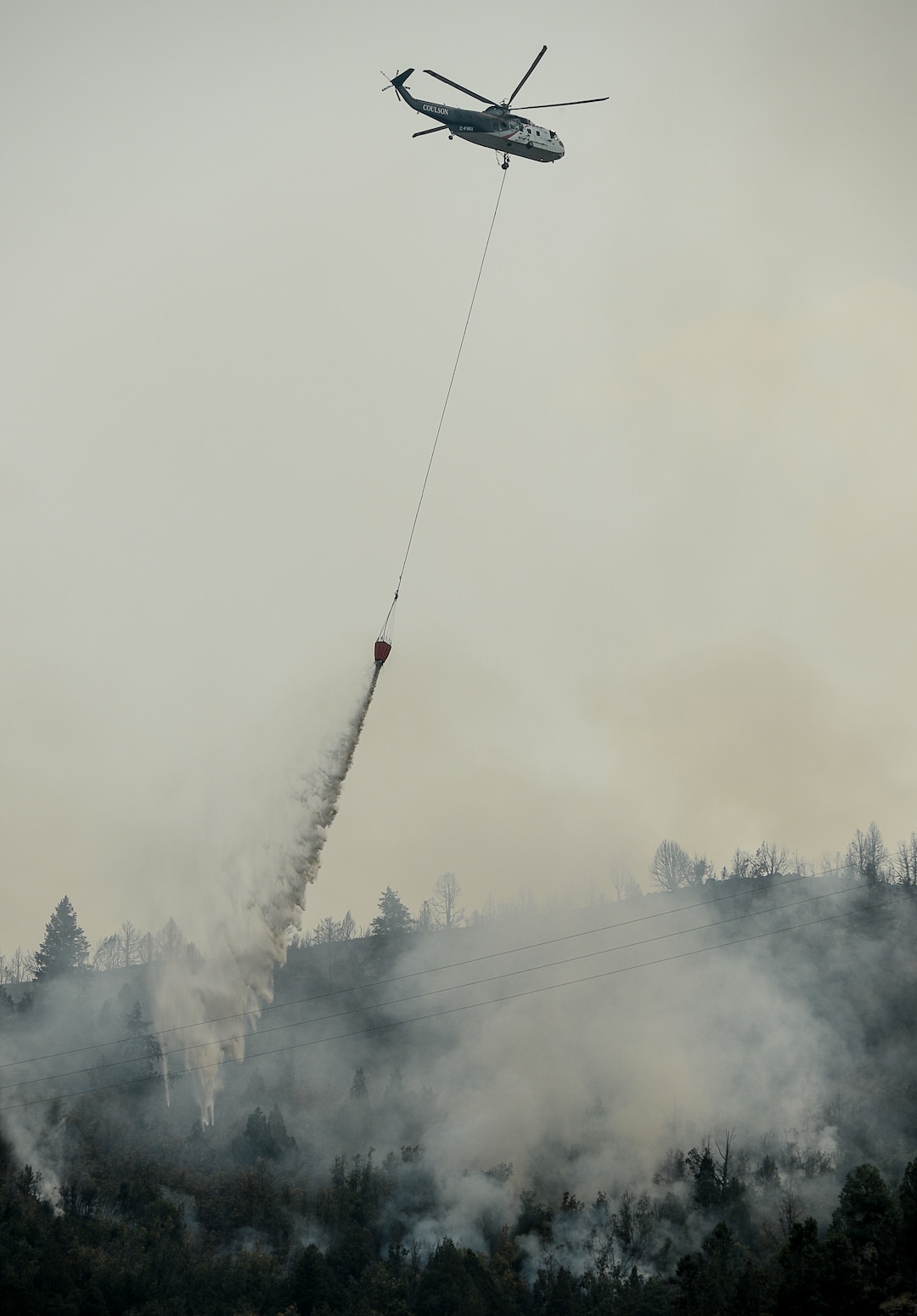(Francisco Kjolseth  |  The Salt Lake Tribune)  Crews continue to battle the Coal Hollow Fire near Highway 6 on Saturday, Aug. 11, 2018.