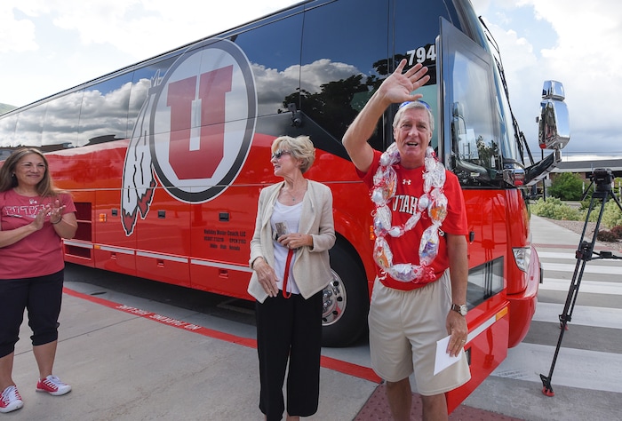 (Francisco Kjolseth  |  The Salt Lake Tribune)  University of Utah athletic director Chris Hill says goodbye to friends and staff at the Huntsman Center on Friday, June 1, 2018, as he gets ready to climb aboard a red Ute-branded Holiday Motor coach bus, alongside his wife Kathy, to the sounds of cheers and applause after 31 years on the job.