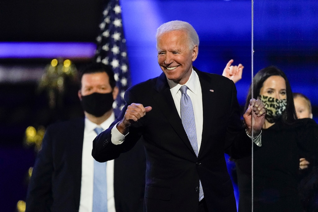 (Andrew Harnik | AP file photo) President-elect Joe Biden reacts as he stands on stage after speaking Saturday, Nov. 7, 2020, in Wilmington, Del. On Monday, he named David Kessler — a one-time aide to Sen. Orrin Hatch — as a co-chairman of an advisory board that will help form his response to COVID-19.